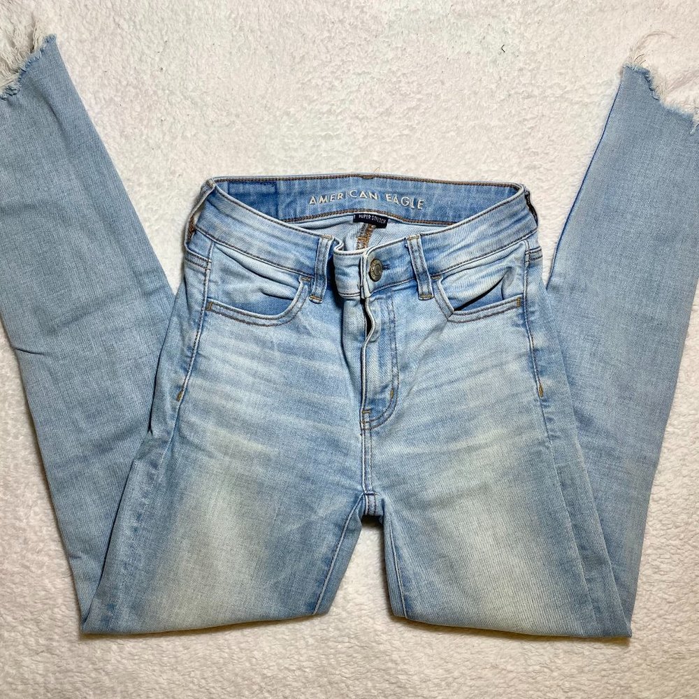 American Eagle Distressed Light-Wash Skinny Jeans (Size 25)